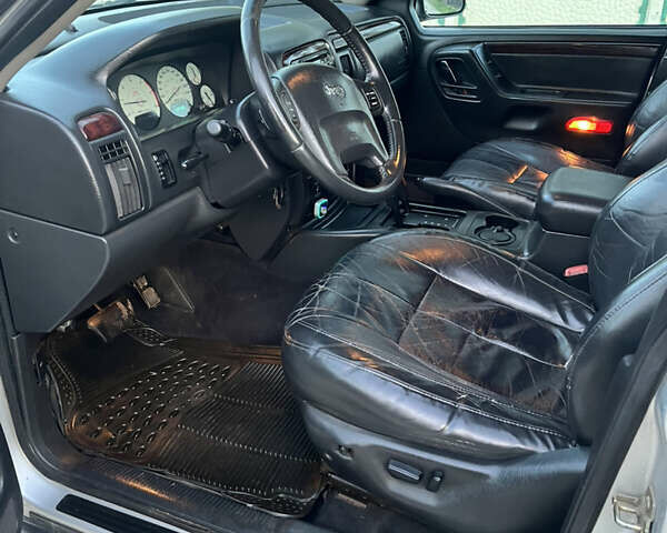 Сірий Джип Grand Cherokee, об'ємом двигуна 2.69 л та пробігом 250 тис. км за 9700 $, фото 23 на Automoto.ua
