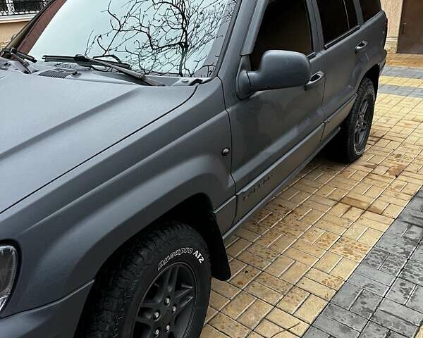 Сірий Джип Grand Cherokee, об'ємом двигуна 2.69 л та пробігом 359 тис. км за 11000 $, фото 5 на Automoto.ua