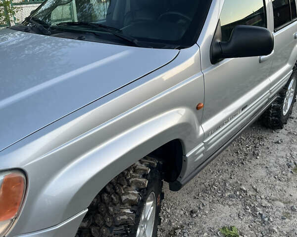 Сірий Джип Grand Cherokee, об'ємом двигуна 2.69 л та пробігом 250 тис. км за 9700 $, фото 2 на Automoto.ua