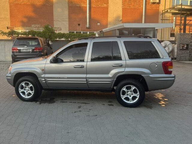 Сірий Джип Grand Cherokee, об'ємом двигуна 0.27 л та пробігом 333 тис. км за 3950 $, фото 7 на Automoto.ua