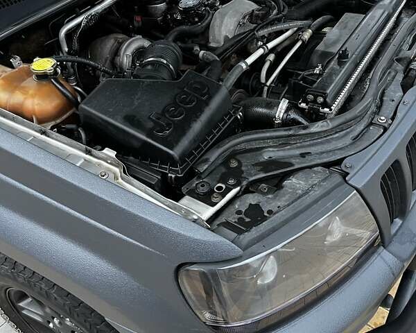 Сірий Джип Grand Cherokee, об'ємом двигуна 2.69 л та пробігом 359 тис. км за 11000 $, фото 9 на Automoto.ua