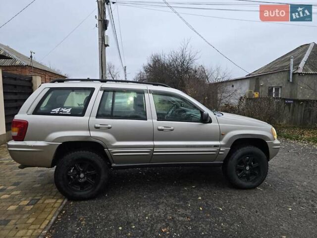 Сірий Джип Grand Cherokee, об'ємом двигуна 2.69 л та пробігом 300 тис. км за 6000 $, фото 5 на Automoto.ua