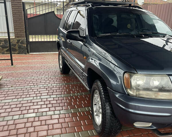 Серый Джип Гранд Чероки, объемом двигателя 2.7 л и пробегом 231 тыс. км за 9500 $, фото 9 на Automoto.ua