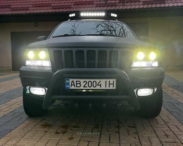 Сірий Джип Grand Cherokee, об'ємом двигуна 2.69 л та пробігом 359 тис. км за 11000 $, фото 2 на Automoto.ua