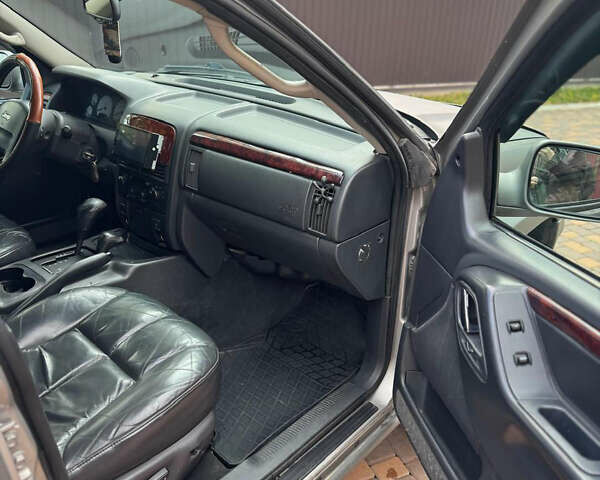 Джип Гранд Чероки 2002 в Сторожинце на Automoto.ua Серый Джип Гранд Чероки, объемом двигателя 2.69 л и пробегом 248 тыс. км за 8990 $, фото 19 на Automoto.ua