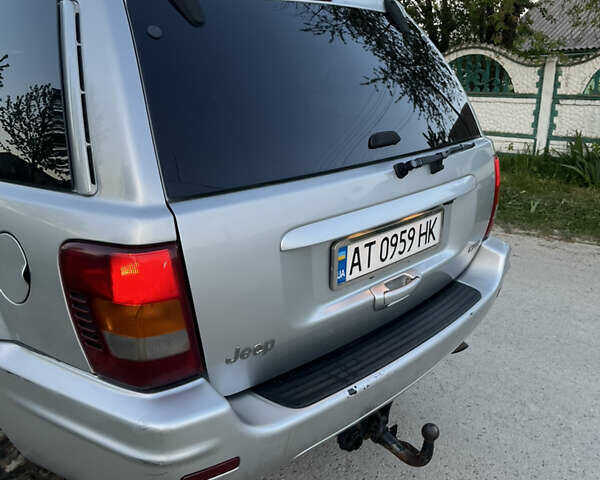 Сірий Джип Grand Cherokee, об'ємом двигуна 2.69 л та пробігом 250 тис. км за 9700 $, фото 8 на Automoto.ua