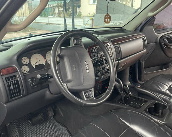 Серый Джип Гранд Чероки, объемом двигателя 2.7 л и пробегом 231 тыс. км за 9500 $, фото 5 на Automoto.ua