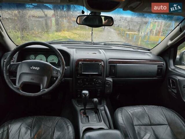 Сірий Джип Grand Cherokee, об'ємом двигуна 2.69 л та пробігом 300 тис. км за 6000 $, фото 18 на Automoto.ua