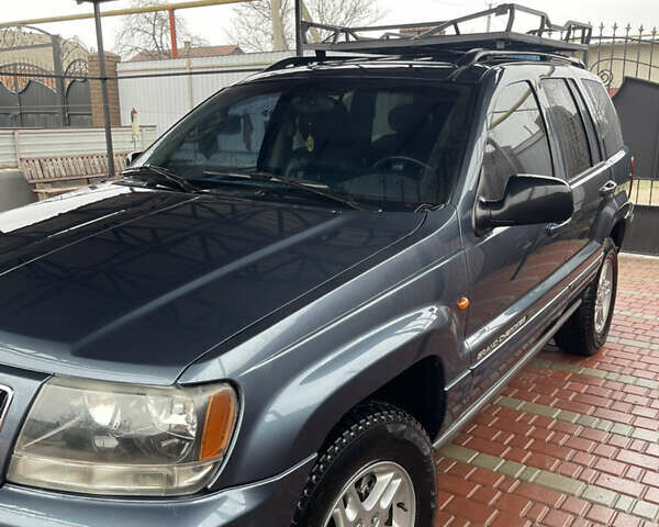 Серый Джип Гранд Чероки, объемом двигателя 2.7 л и пробегом 231 тыс. км за 9500 $, фото 11 на Automoto.ua