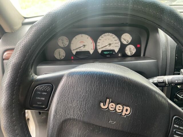 Серый Джип Гранд Чероки, объемом двигателя 2.7 л и пробегом 460 тыс. км за 5500 $, фото 3 на Automoto.ua