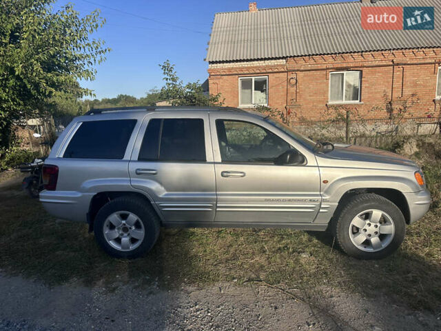 Сірий Джип Grand Cherokee, об'ємом двигуна 2.69 л та пробігом 331 тис. км за 9200 $, фото 1 на Automoto.ua