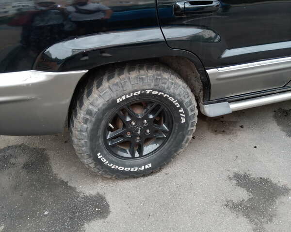 Серый Джип Гранд Чероки, объемом двигателя 2.69 л и пробегом 210 тыс. км за 8000 $, фото 12 на Automoto.ua