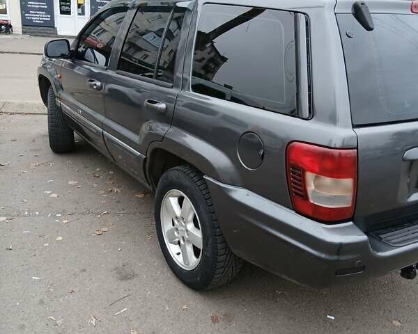 Серый Джип Гранд Чероки, объемом двигателя 2.69 л и пробегом 290 тыс. км за 7500 $, фото 7 на Automoto.ua