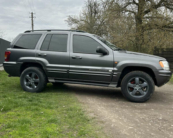 Сірий Джип Grand Cherokee, об'ємом двигуна 2.69 л та пробігом 317 тис. км за 9100 $, фото 3 на Automoto.ua