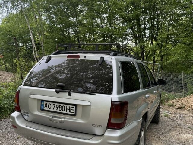 Сірий Джип Grand Cherokee, об'ємом двигуна 2.7 л та пробігом 353 тис. км за 8500 $, фото 1 на Automoto.ua