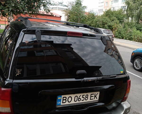 Серый Джип Гранд Чероки, объемом двигателя 2.69 л и пробегом 210 тыс. км за 8000 $, фото 5 на Automoto.ua