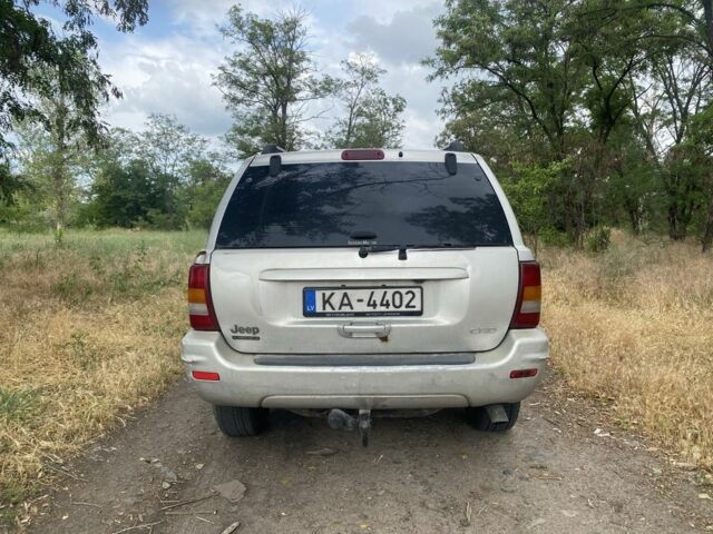 Серый Джип Гранд Чероки, объемом двигателя 2.7 л и пробегом 460 тыс. км за 5500 $, фото 2 на Automoto.ua