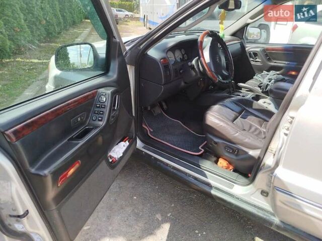 Сірий Джип Grand Cherokee, об'ємом двигуна 2.69 л та пробігом 438 тис. км за 8500 $, фото 9 на Automoto.ua