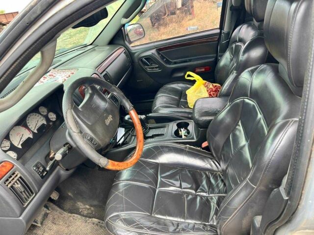 Серый Джип Гранд Чероки, объемом двигателя 2.7 л и пробегом 213 тыс. км за 6000 $, фото 5 на Automoto.ua