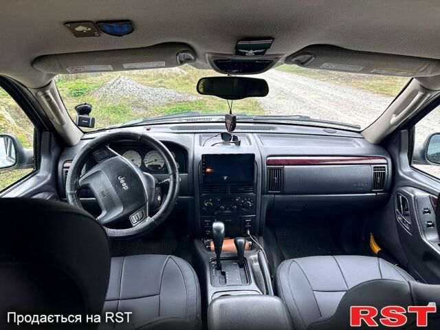 Сірий Джип Grand Cherokee, об'ємом двигуна 2.7 л та пробігом 331 тис. км за 9200 $, фото 2 на Automoto.ua