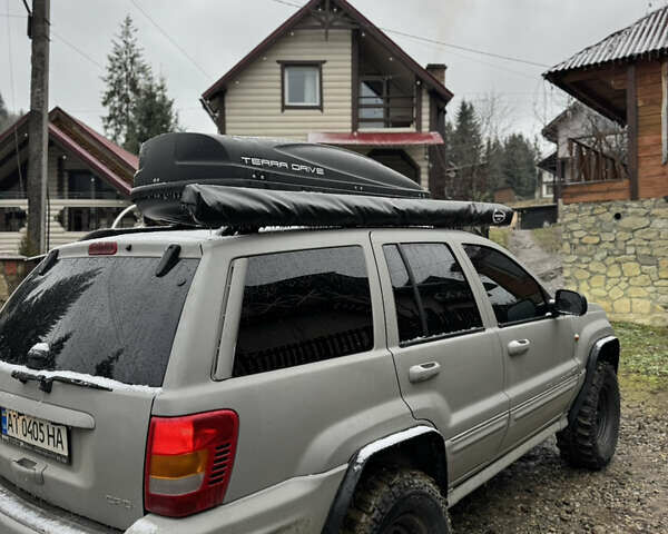 Сірий Джип Grand Cherokee, об'ємом двигуна 2.69 л та пробігом 290 тис. км за 12300 $, фото 4 на Automoto.ua