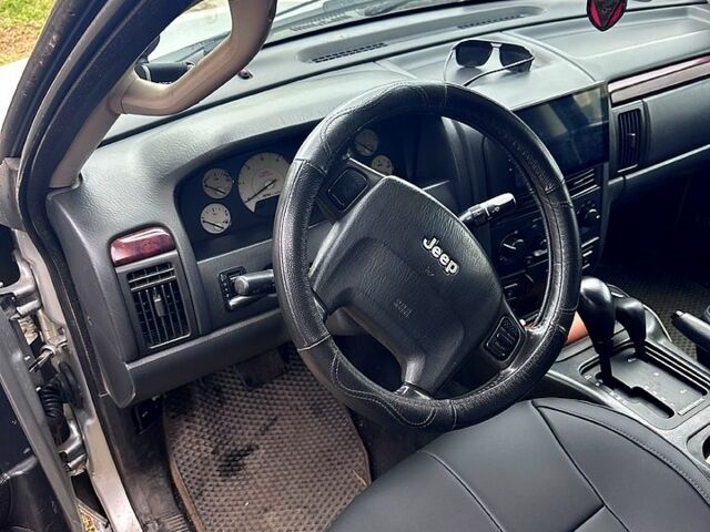 Сірий Джип Grand Cherokee, об'ємом двигуна 2.7 л та пробігом 331 тис. км за 9200 $, фото 1 на Automoto.ua
