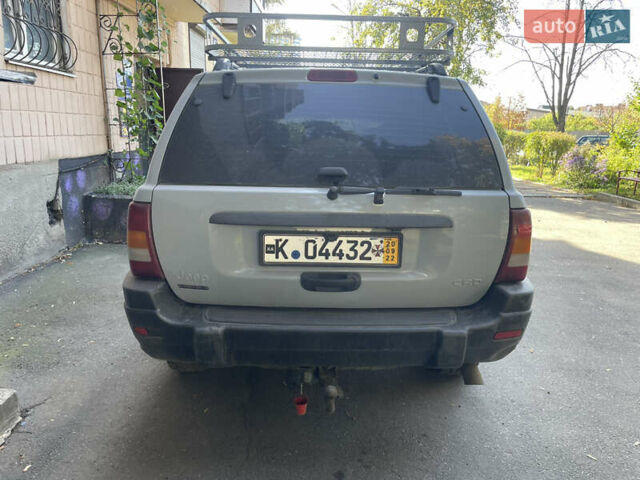 Серый Джип Гранд Чероки, объемом двигателя 2.7 л и пробегом 250 тыс. км за 5000 $, фото 2 на Automoto.ua