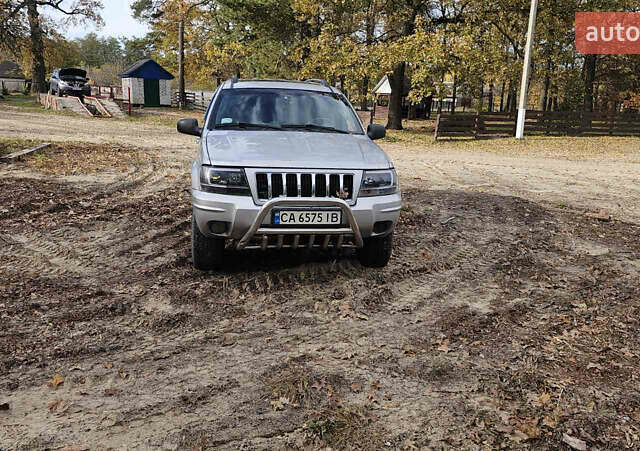 Серый Джип Гранд Чероки, объемом двигателя 2.69 л и пробегом 440 тыс. км за 5000 $, фото 1 на Automoto.ua