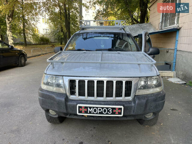 Серый Джип Гранд Чероки, объемом двигателя 2.7 л и пробегом 250 тыс. км за 5000 $, фото 1 на Automoto.ua