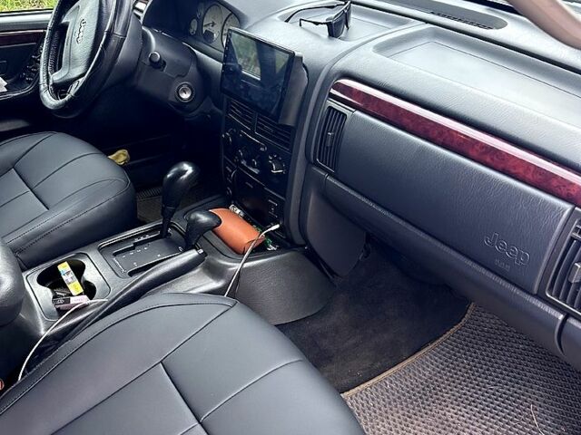 Сірий Джип Grand Cherokee, об'ємом двигуна 2.7 л та пробігом 331 тис. км за 9200 $, фото 7 на Automoto.ua