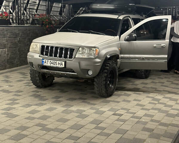 Серый Джип Гранд Чероки, объемом двигателя 2.69 л и пробегом 283 тыс. км за 12000 $, фото 6 на Automoto.ua