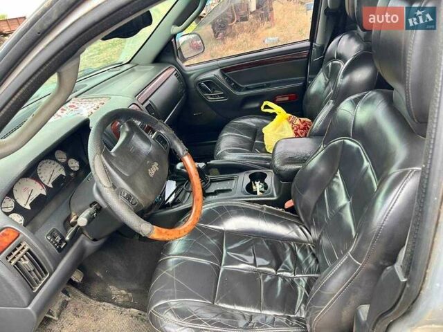 Серый Джип Гранд Чероки, объемом двигателя 2.7 л и пробегом 213 тыс. км за 6000 $, фото 4 на Automoto.ua