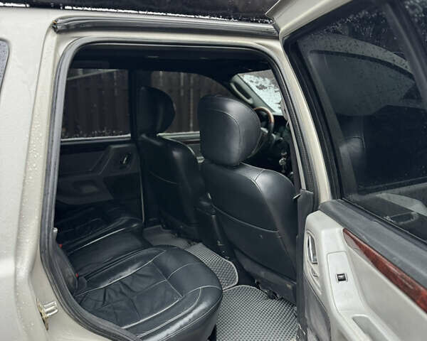 Сірий Джип Grand Cherokee, об'ємом двигуна 2.69 л та пробігом 290 тис. км за 12300 $, фото 9 на Automoto.ua
