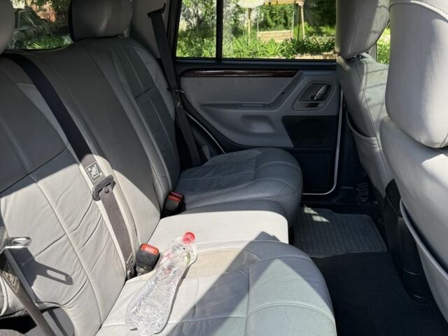 Сірий Джип Grand Cherokee, об'ємом двигуна 2.7 л та пробігом 353 тис. км за 8500 $, фото 4 на Automoto.ua