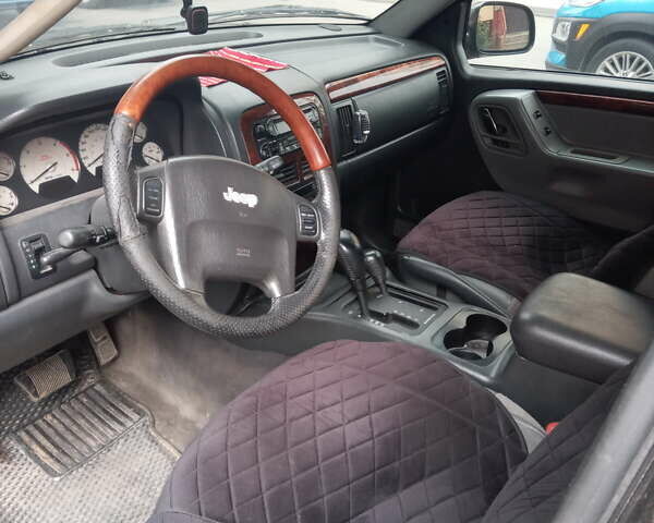 Серый Джип Гранд Чероки, объемом двигателя 2.69 л и пробегом 210 тыс. км за 8000 $, фото 11 на Automoto.ua