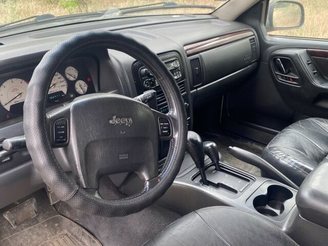 Серый Джип Гранд Чероки, объемом двигателя 2.7 л и пробегом 460 тыс. км за 5500 $, фото 7 на Automoto.ua
