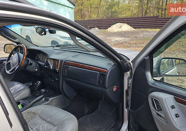 Серый Джип Гранд Чероки, объемом двигателя 2.69 л и пробегом 440 тыс. км за 5000 $, фото 6 на Automoto.ua