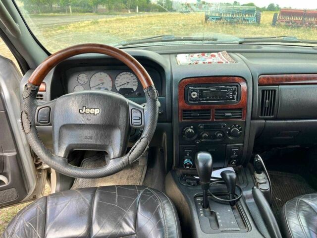Серый Джип Гранд Чероки, объемом двигателя 2.7 л и пробегом 213 тыс. км за 6000 $, фото 6 на Automoto.ua