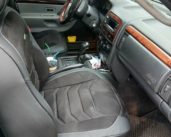 Серый Джип Гранд Чероки, объемом двигателя 2.69 л и пробегом 290 тыс. км за 7500 $, фото 4 на Automoto.ua