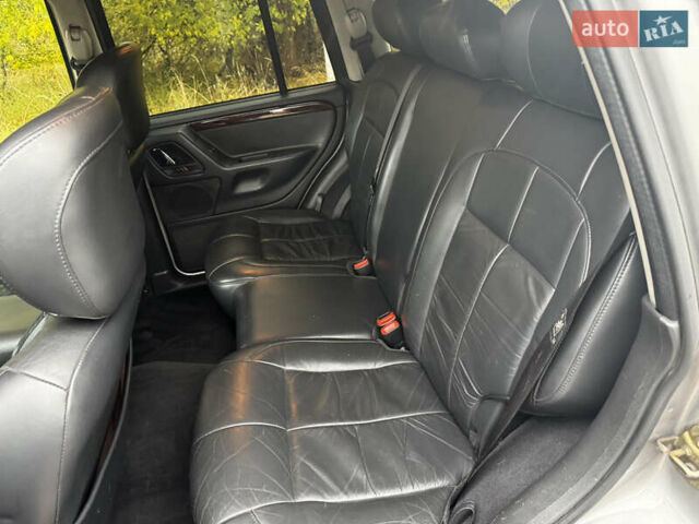 Серый Джип Гранд Чероки, объемом двигателя 2.7 л и пробегом 298 тыс. км за 5800 $, фото 9 на Automoto.ua