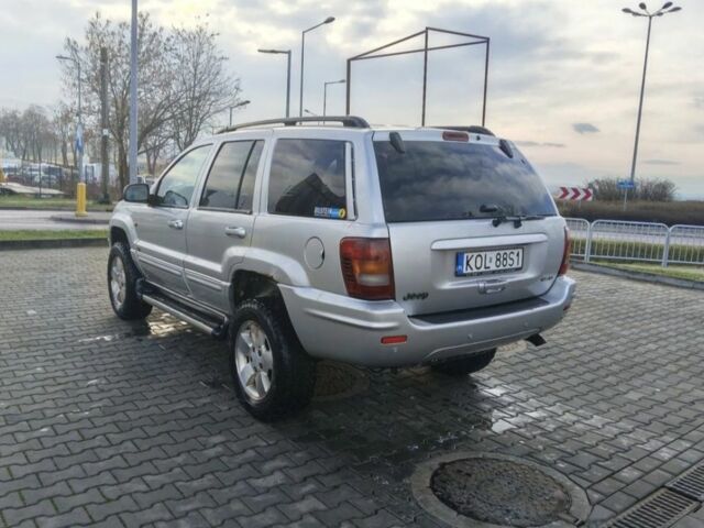 Серый Джип Гранд Чероки, объемом двигателя 2.7 л и пробегом 290 тыс. км за 3100 $, фото 2 на Automoto.ua