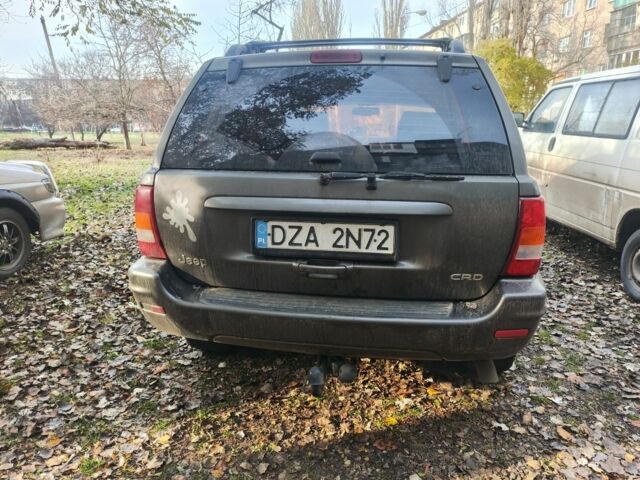 Сірий Джип Grand Cherokee, об'ємом двигуна 3.1 л та пробігом 420 тис. км за 3600 $, фото 6 на Automoto.ua