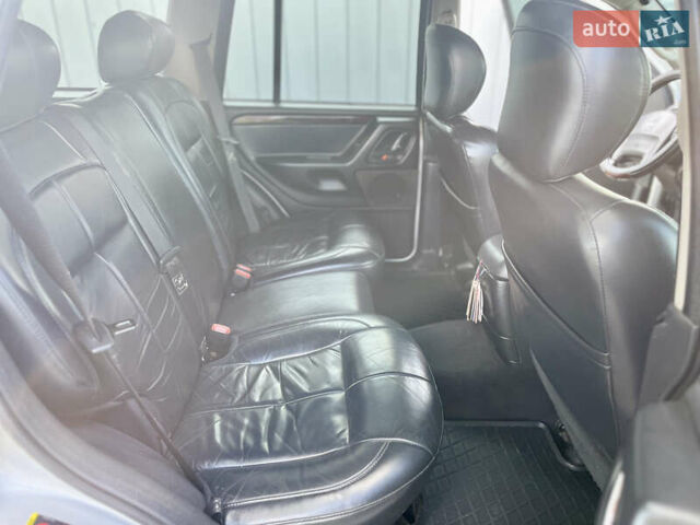 Сірий Джип Grand Cherokee, об'ємом двигуна 2.69 л та пробігом 343 тис. км за 8100 $, фото 35 на Automoto.ua