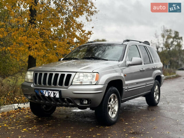 Серый Джип Гранд Чероки, объемом двигателя 2.7 л и пробегом 298 тыс. км за 5800 $, фото 1 на Automoto.ua