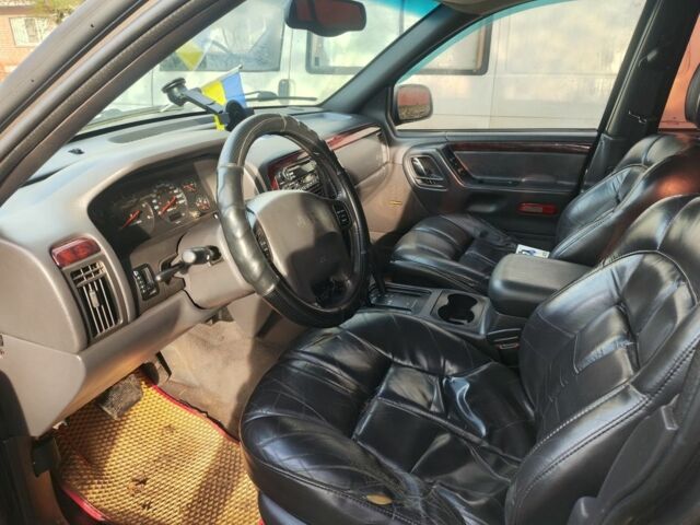 Сірий Джип Grand Cherokee, об'ємом двигуна 3.1 л та пробігом 420 тис. км за 3600 $, фото 4 на Automoto.ua