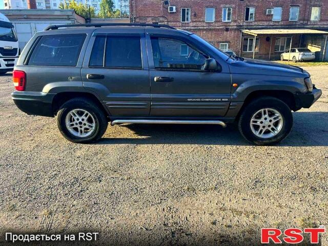 Сірий Джип Grand Cherokee, об'ємом двигуна 4 л та пробігом 274 тис. км за 2700 $, фото 3 на Automoto.ua