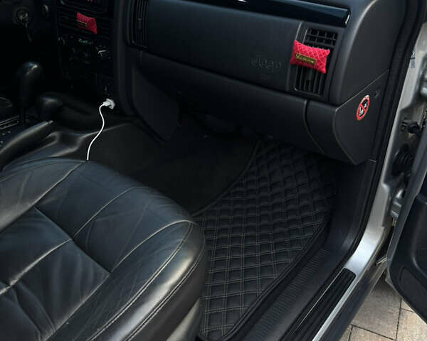 Серый Джип Гранд Чероки, объемом двигателя 2.7 л и пробегом 260 тыс. км за 11700 $, фото 41 на Automoto.ua