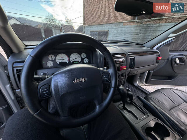 Серый Джип Гранд Чероки, объемом двигателя 2.7 л и пробегом 260 тыс. км за 11700 $, фото 43 на Automoto.ua