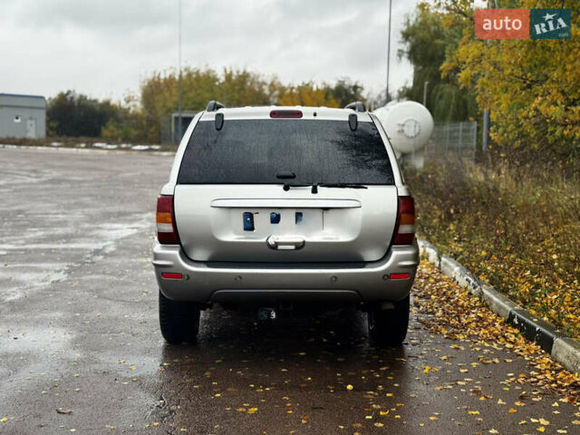 Серый Джип Гранд Чероки, объемом двигателя 2.7 л и пробегом 298 тыс. км за 5800 $, фото 4 на Automoto.ua