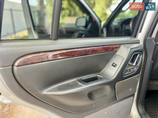 Сірий Джип Grand Cherokee, об'ємом двигуна 2.69 л та пробігом 343 тис. км за 8100 $, фото 27 на Automoto.ua